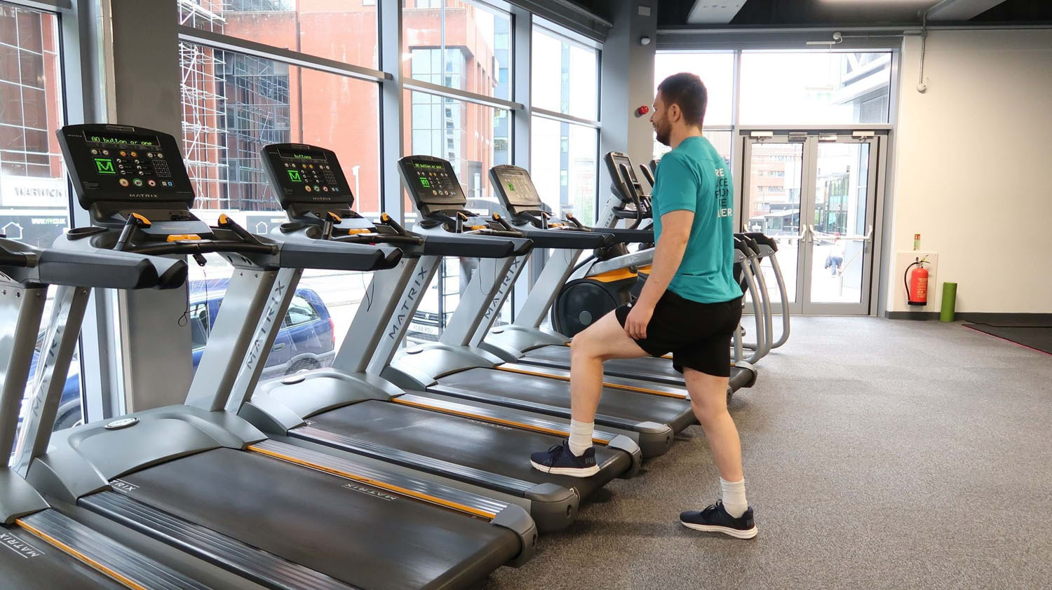 Setting up a machine for a workout PureGym