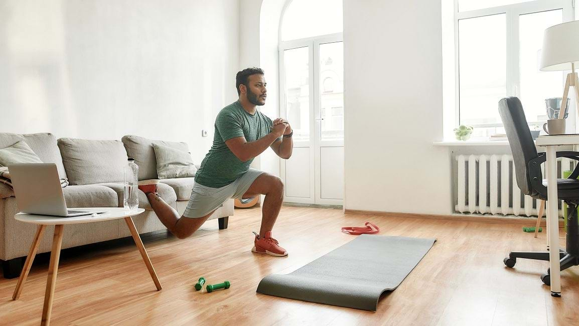 Man doing an exercise in his home