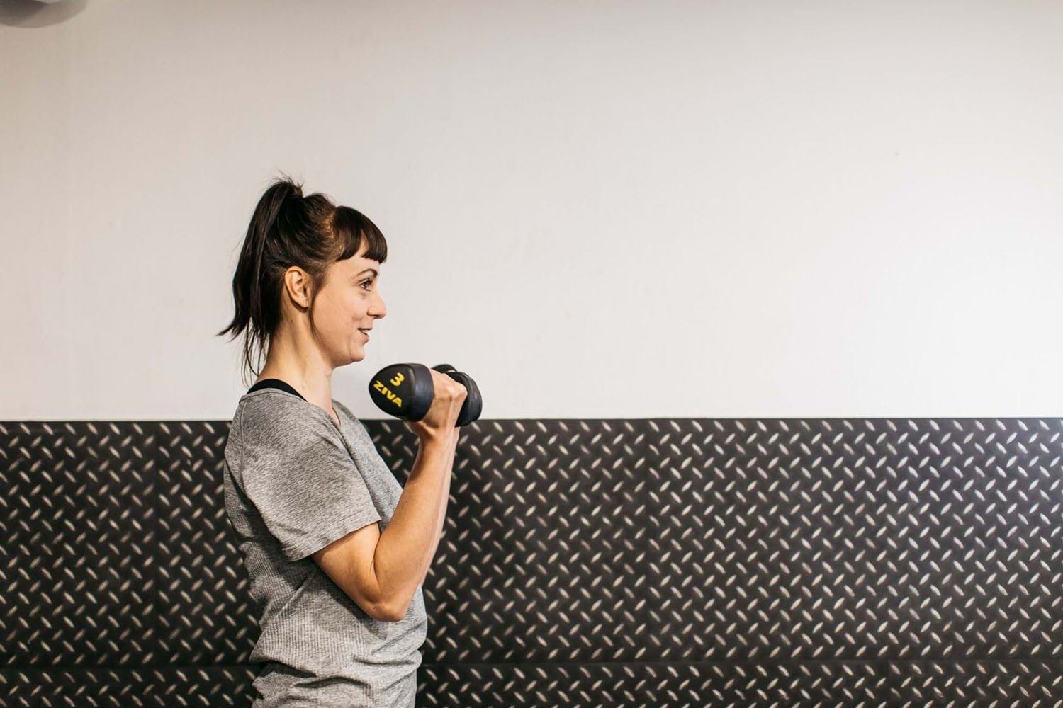 lady with dumbbell