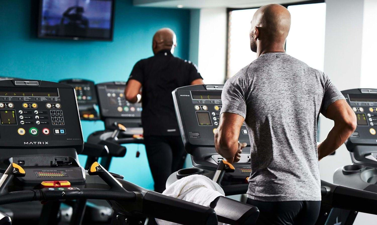 man running on treadmill