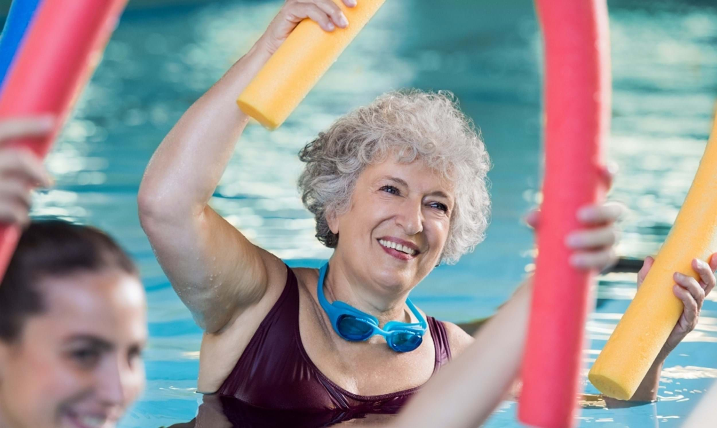 Smiling lady in pool