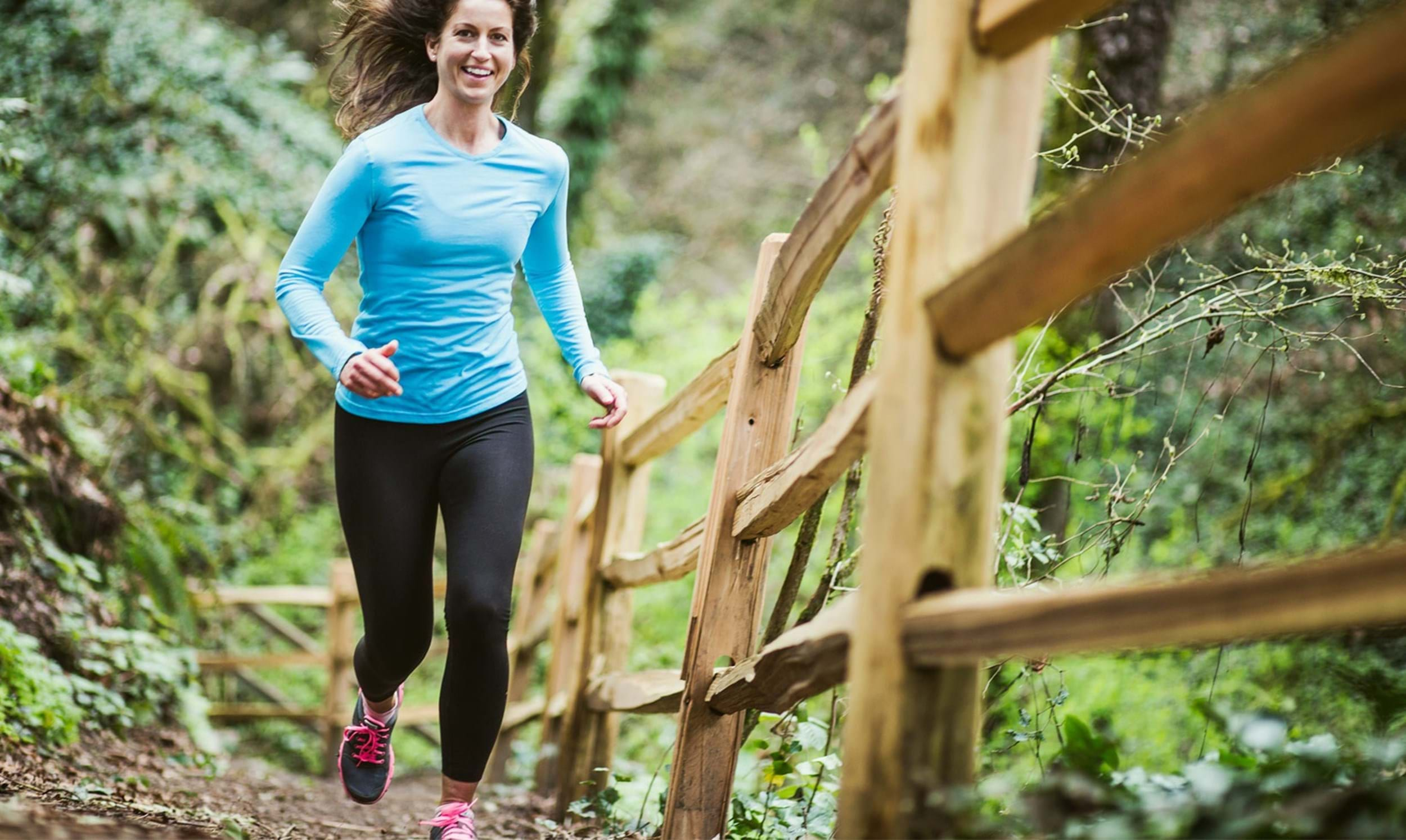 lady running up hill