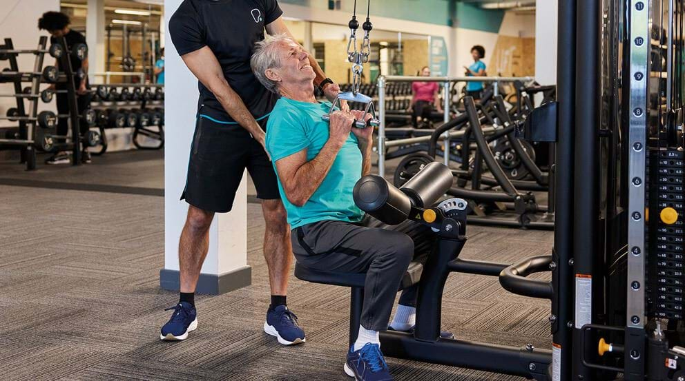 Senior doing resistance training